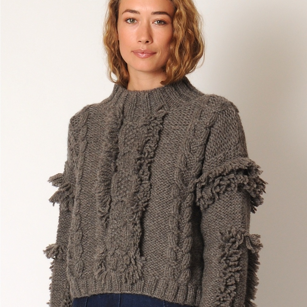 Kordal Studio Cable Knit Fringe Sweater In Fog